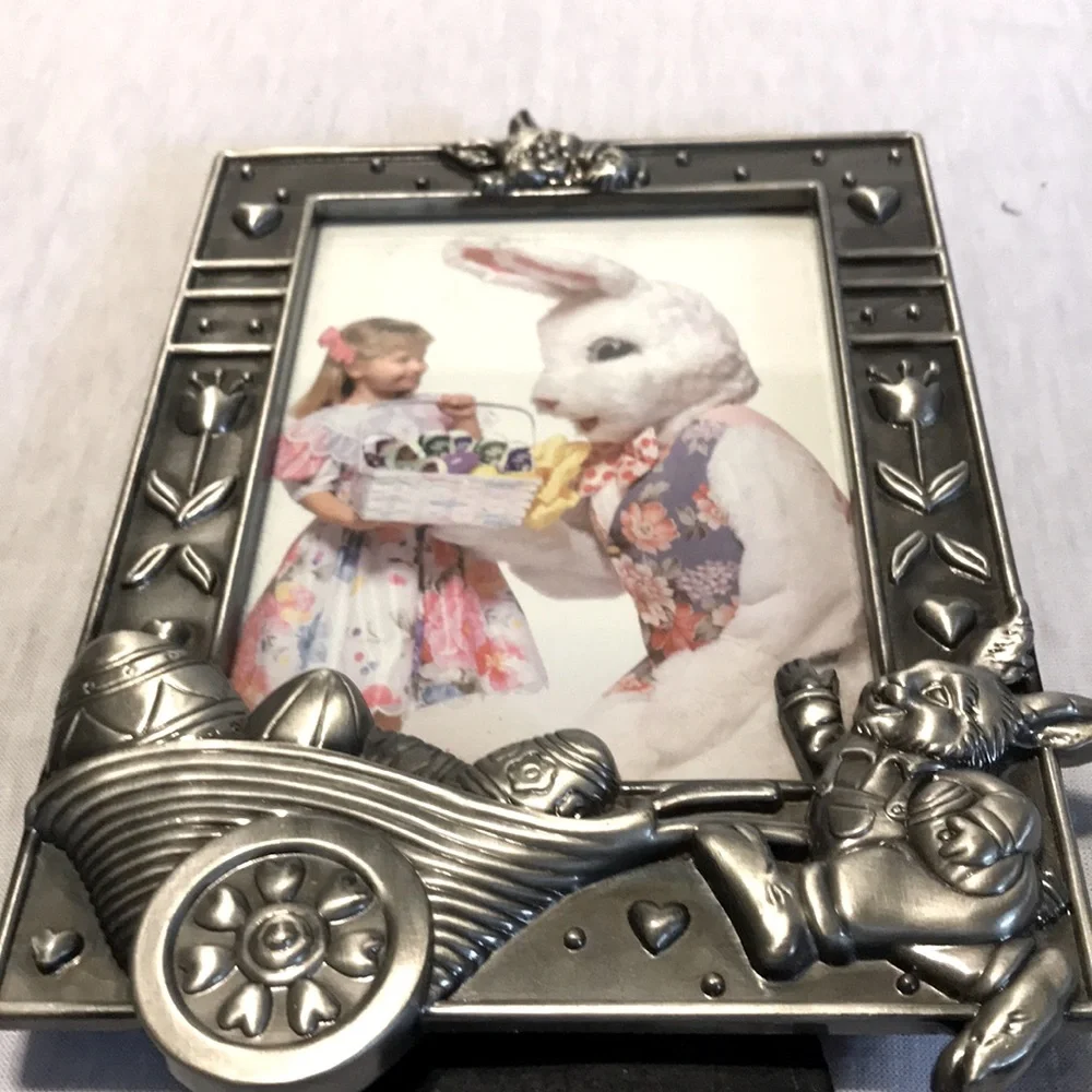 Silver metal rabbit with wheel barrel of eggs picture frame.
